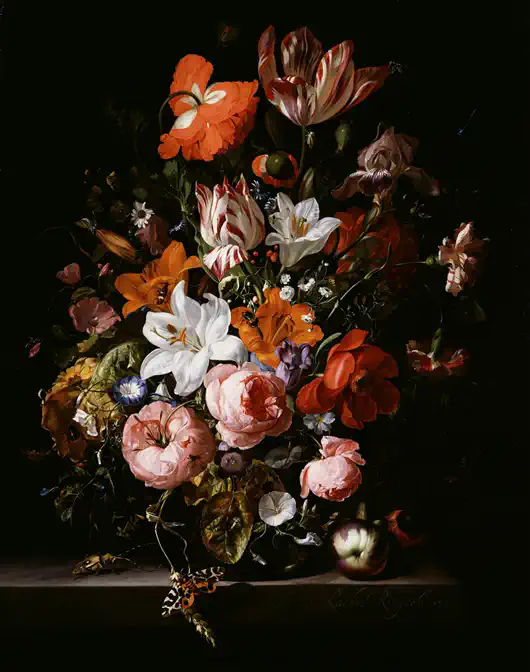 Flowers in a vase on a stone slab